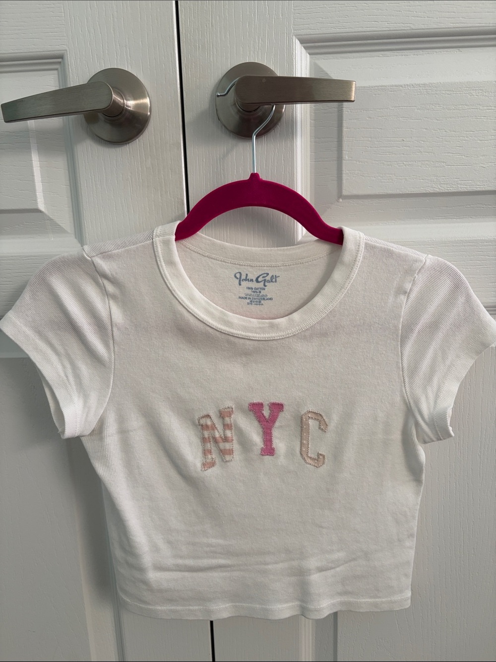 Brandy Melville White Short Sleeve Tee with Pink & Beige 'NYC' Applique